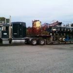 Tractor & Planter loaded up on our truck and trailer